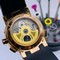 UN-Classic-Rome-Black-Gold-Dial-on-Black-Rubber-Strap Replica