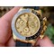 Daytona-116518-Noob-1-1-Best-Edition-YG-Plated-904L-SS-Case-Goid-Diamonds-Dial-on-Black-Rubber-Strap-SA4130-V4 Replica