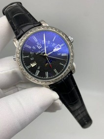 Patek Philippe Geneve Engraved Silver Black Dial
