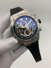 Tag Heuer Silver Case Skeleton on Black Rubber Strap