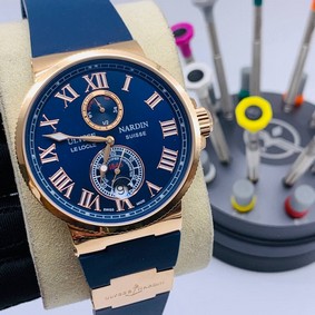 UN Classic Rome Blue Dial Gold Case on Blue Rubber Strap
