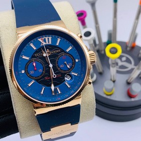 UN Maxi Marine Blue Dial Gold Case on Blue Rubber Strap