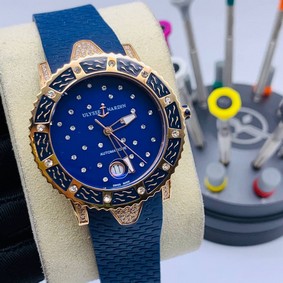 UN Diamond Blue Dial Case Gold Rubber Strap