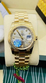 Rolex DayDate YG/YG White Dial High Version